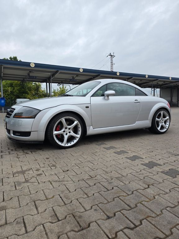 TT