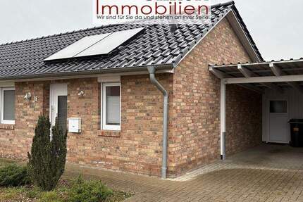 RESERVIERT-gut vermietete, ebenerdige Doppelhaushälfte Bj. 2016 mit Garten u. Carport 3 zimmer
