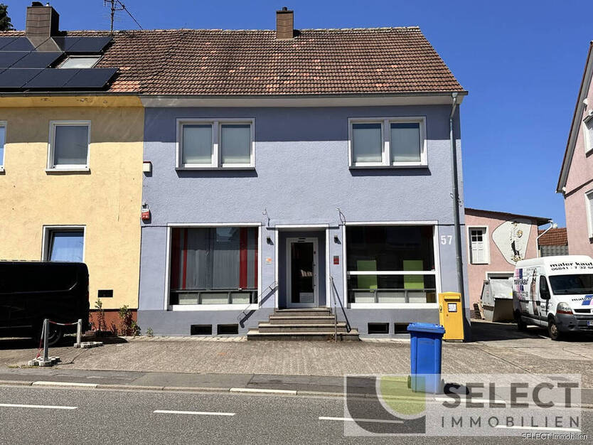Wohn- und Geschäftshaus mit großer Garage und Garten