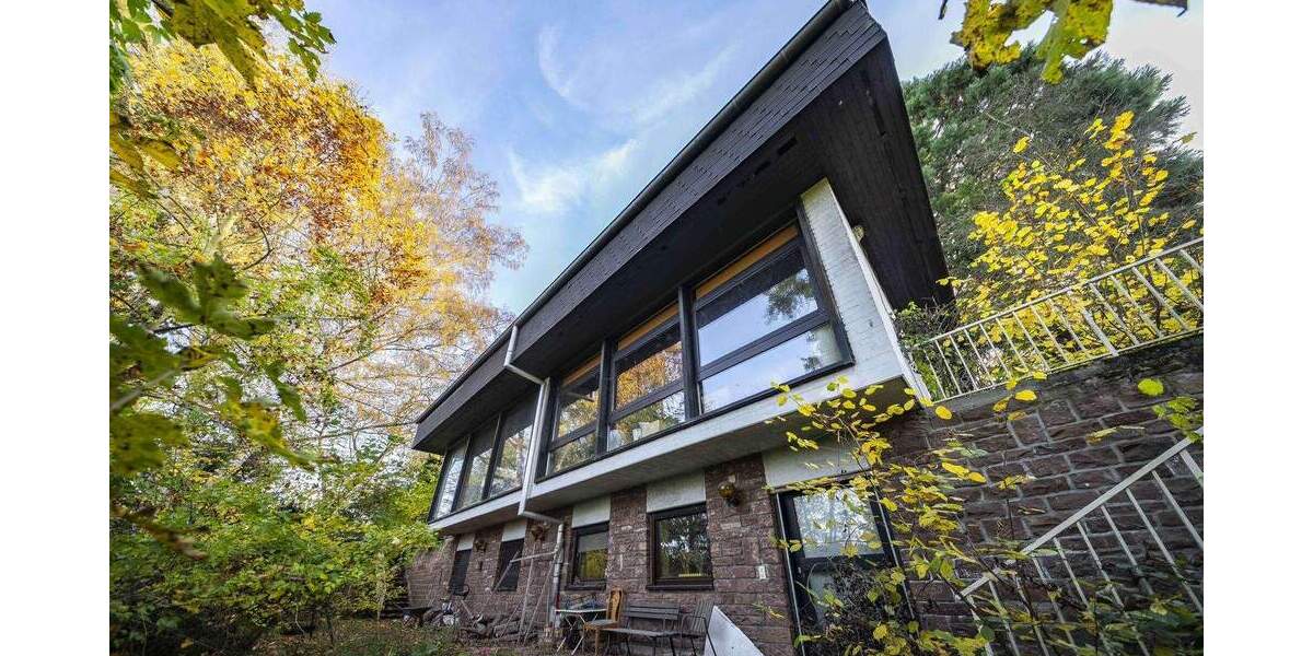 Einzigartiges Architektenhaus mit Einliegerwohnung - direkt am Waldrand in begehrter Höhenlage 7 zimmer