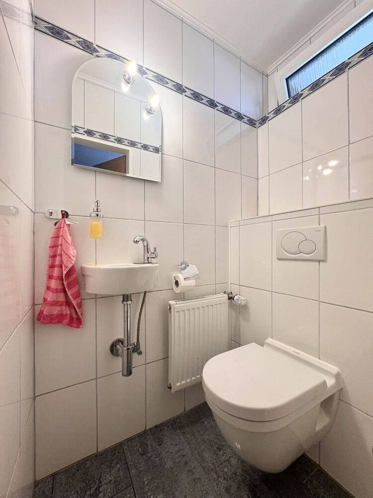 Familienfreundliches Reihenmittelhaus mit Tiefgarage und Garten in ruhiger Lage von Scherpenseel