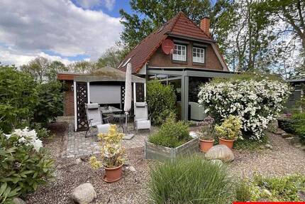 Wunderbares Einfamilienhaus inmitten eines Gartentraumes! 5 zimmer