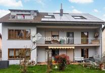 Attraktive EG-Wohnung mit Terrasse, Garten und Garage - Wohnen in ruhiger Lage mit nur drei Parteien