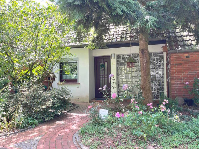 PURNHAGEN-ImmobilieN - Reihenmittelhaus mit Garage in gesuchter Wohnlage von Bremen-Burgdamm!