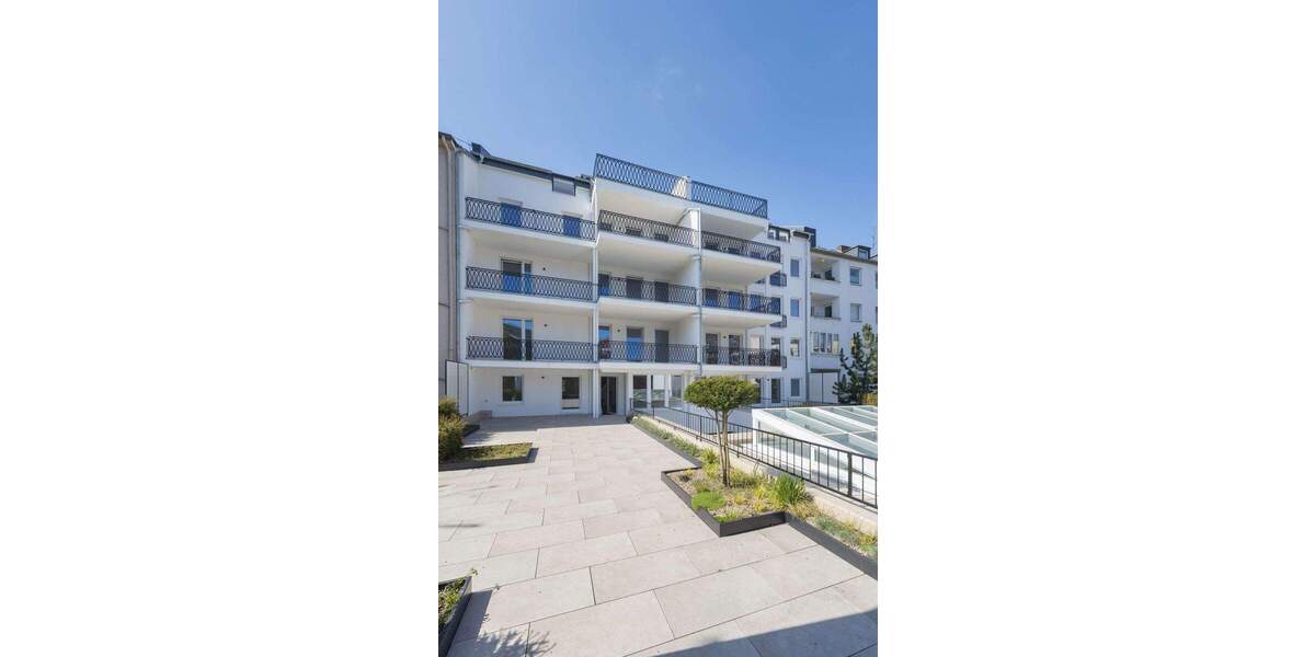 Urbaner Wohntraum: Luxuriöse Maisonette-Wohnung mit Einbauküche, großer Terrasse & Stellplätzen 3 zimmer