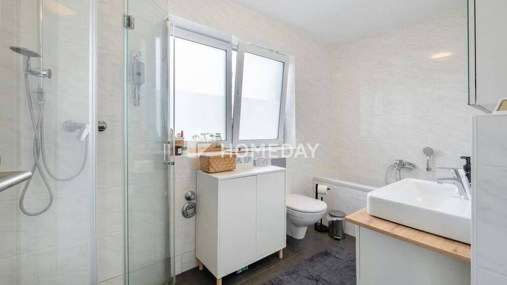 Moderne MaisonetteWohnung mit Südterrasse und Garten