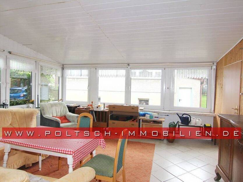 EFH im Bungalowstil mit Wintergarten, Keller und großem Grundstück in ruhiger Siedlungslage