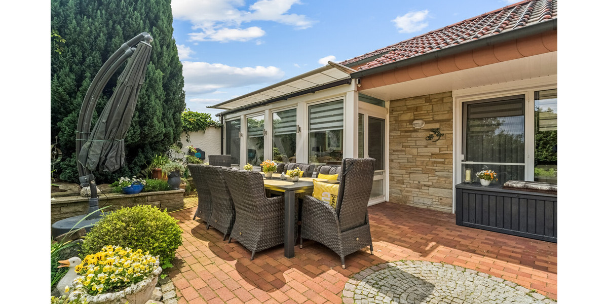 Stilvoller Bungalow mit Wintergarten & Kamin – Wohnen auf einer Ebene in idyllischer Lage - Einfamilienhaus Rheine / Elte Rheine | Angebot:26781763