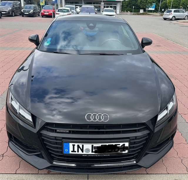 TT