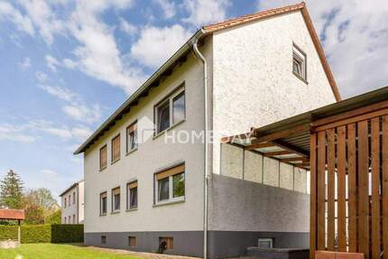 Voll vermietetes Mehrfamilienhaus mit großem Garten, Terrasse und Loggia in idyllischer Lage 1 zimmer