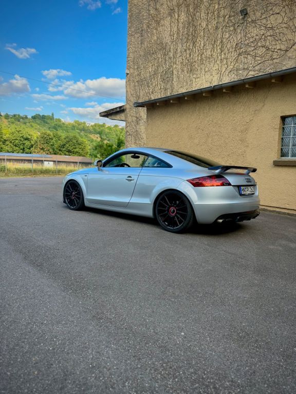 TT