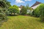 Ein Zuhause zum Verlieben: Stilvolle Doppelhaushälfte mit idyllischem Garten