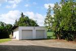 Moderne 2 Zimmer Wohnung mit Traumgarten & Garage in ruhiger Lage