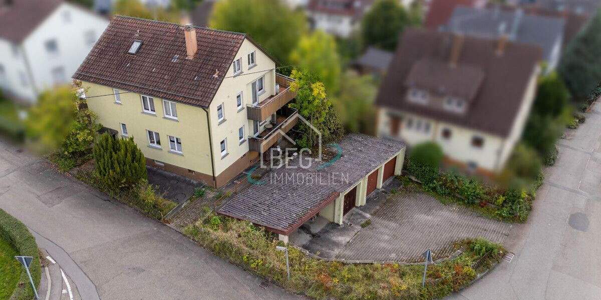Großzügiges Zweifamilienhaus mit Garten, Garagen und viel Gestaltungspotenzial 6 zimmer