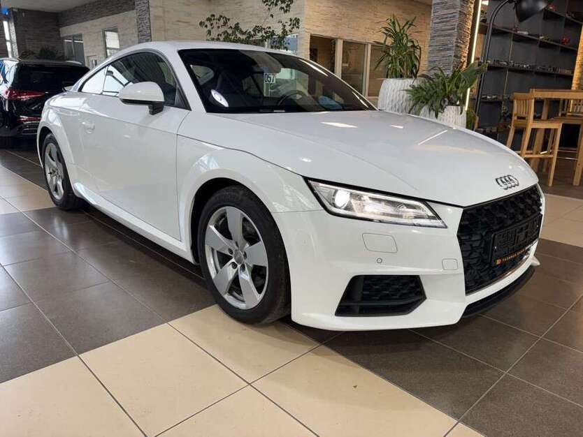 TT