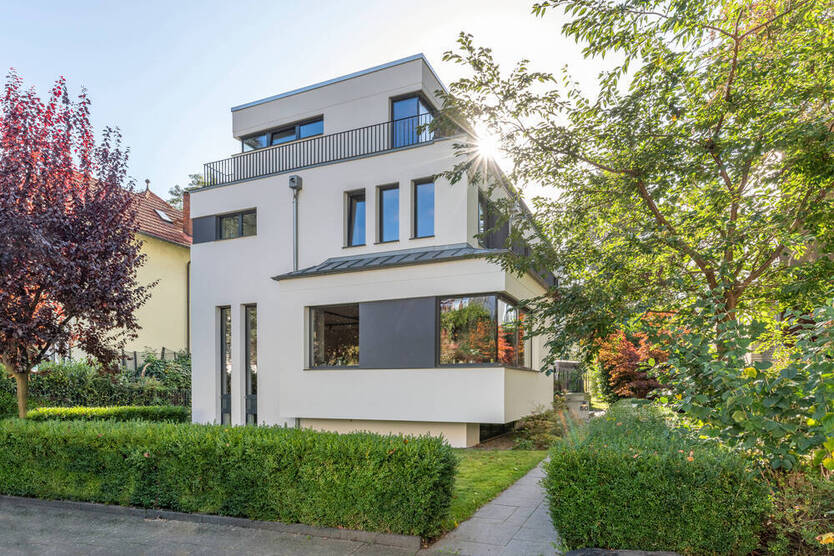 Perfekt für die große Familie. Mit Wohnküche, Kamin und Dachterrasse