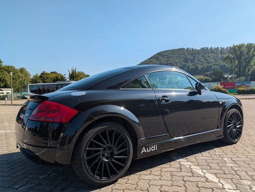 TT