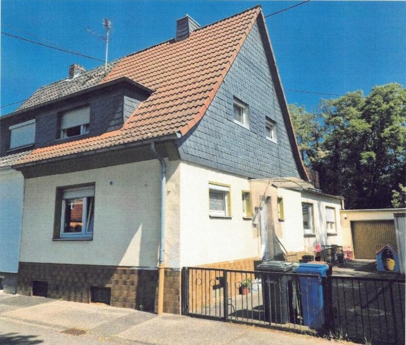 Einfamilienhaus mit Anbau und Aufstockungsmöglichkeit