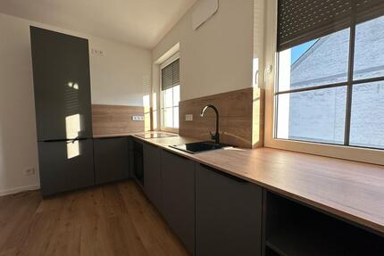 Top Lage! Kernsanierte Dachgeschoßwohnung im Herzen der Stadt