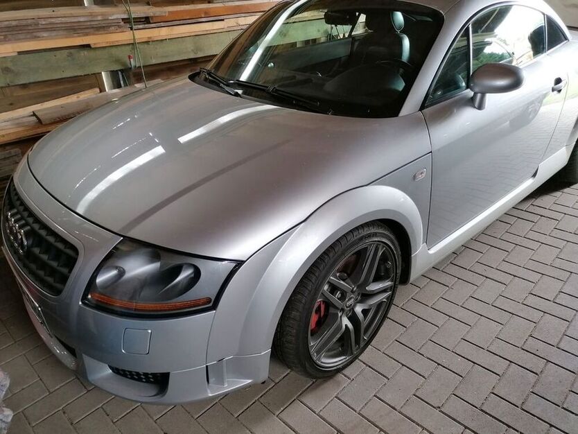 TT