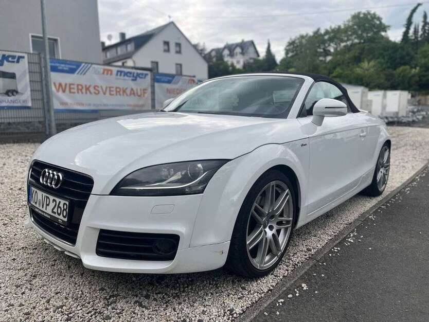 TT