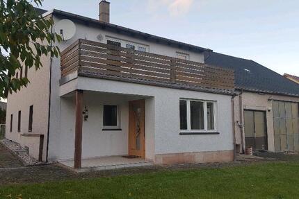 Haus mit Garten, Werkstatt und Garage