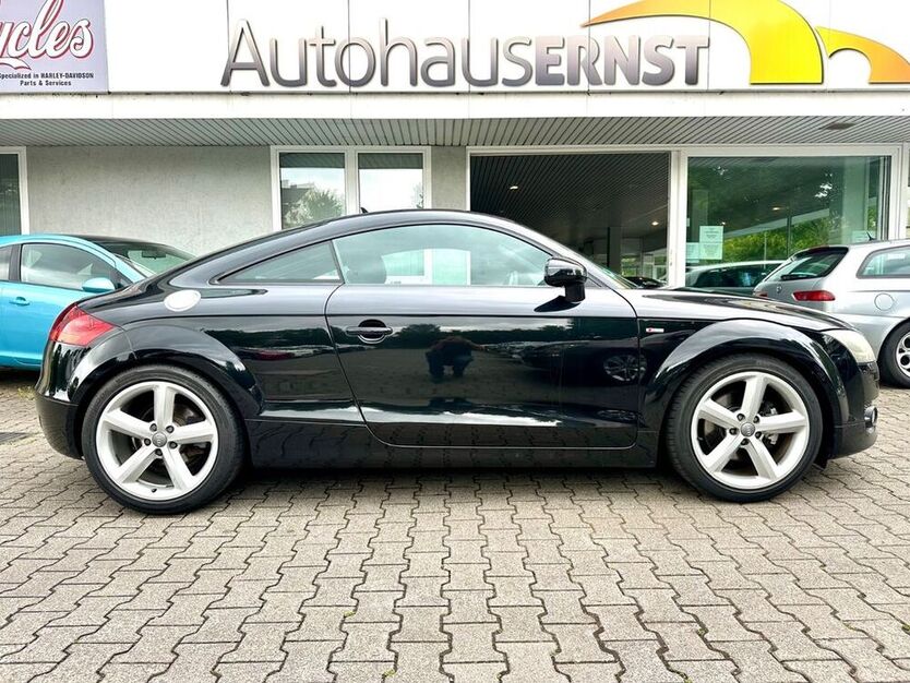 TT
