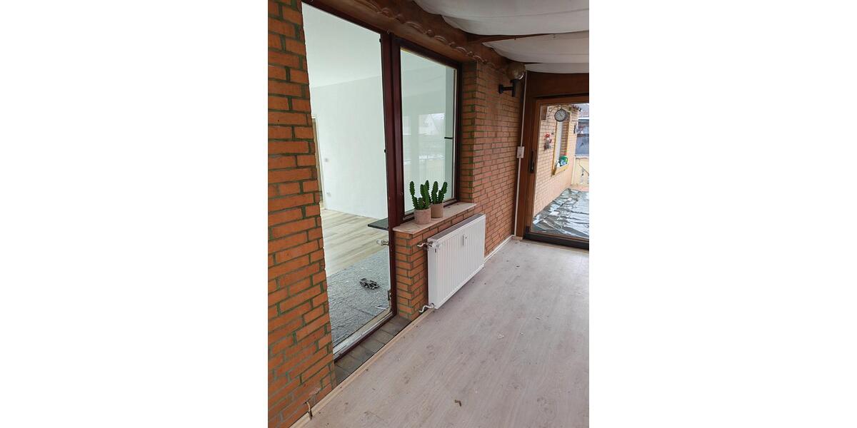 Moderne 3-Zimmer-EG-Wohnung mit Wintergarten & Terrasse 3 zimmer