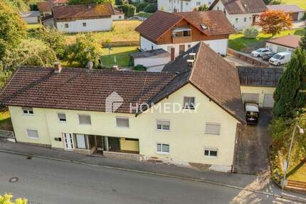 Großzügiges Mehrfamilienhaus mit drei Wohneinheiten + Gewerbe und idyllischem Garten 1 zimmer