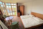 Voll möblierte 1-Zimmer-Wohnung mit Balkon zwischen See und Golfplatz