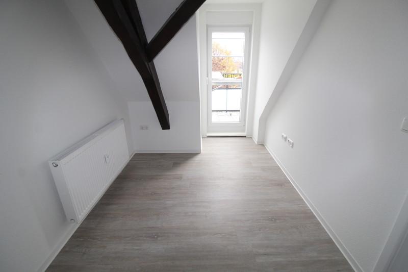 Perfekt für Singles - kleine DG-Wohnung mit Balkon und Fassadenvollwärmeschutz 1 zimmer