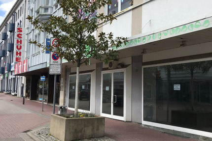 Einzelhandelsfläche Büroräume neben dem Sparkassen Neubau zimmer