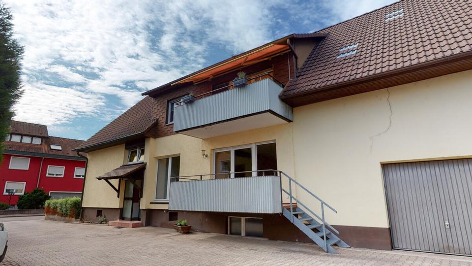 Charmante 3-Zimmer-Hochparterrewohnung mit Balkon, Garage und Gartennutzung in Au am Rhein 3 zimmer