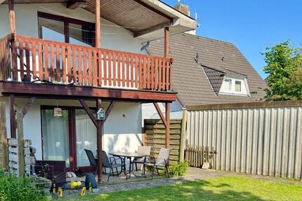 Wohnung mit Garten, Balkon und Garage