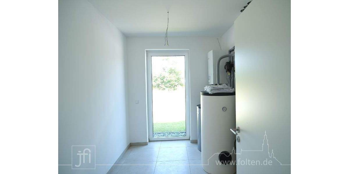 Moderne Haushälfte mit Wärmepumpe, zwei Bädern und überdachter Terrasse 4 zimmer