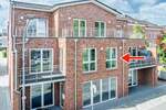 Moderne Obergeschosswohnung mit Balkon - Erstbezug im Stadtkern von Papenburg 2 zimmer