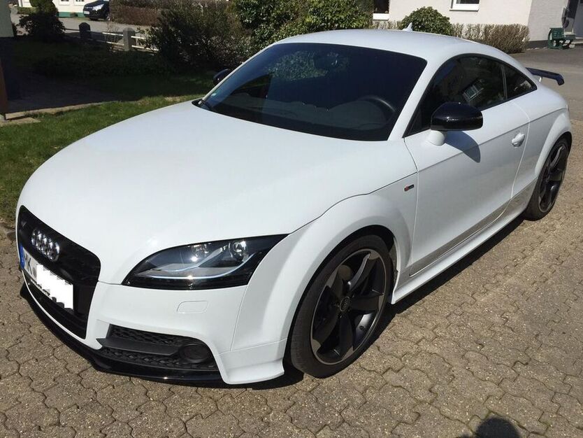 TT