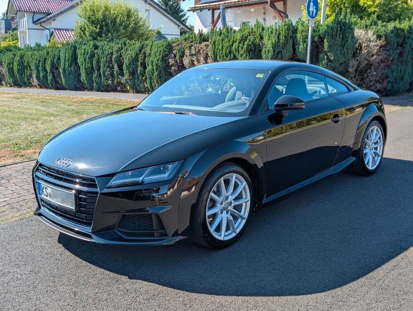 TT