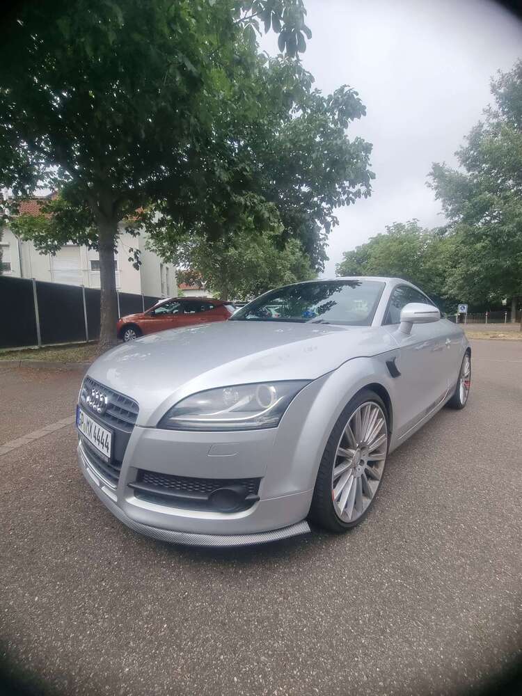 TT