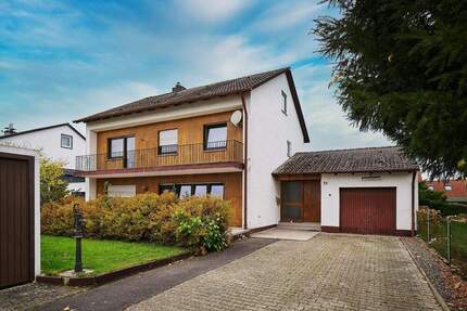 Vielseitiges Zweifamilienhaus mit großem Garten in ruhiger Lage von Geiselhöring 7 zimmer