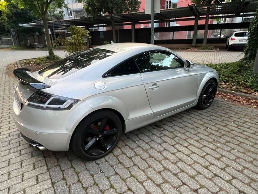 TT