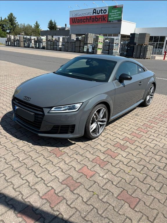 TT