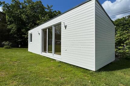 MODULHAUSTINYHAUSKFW55FERTIGHAUSHOLZHAUSBUNGALOWANBAU zimmer