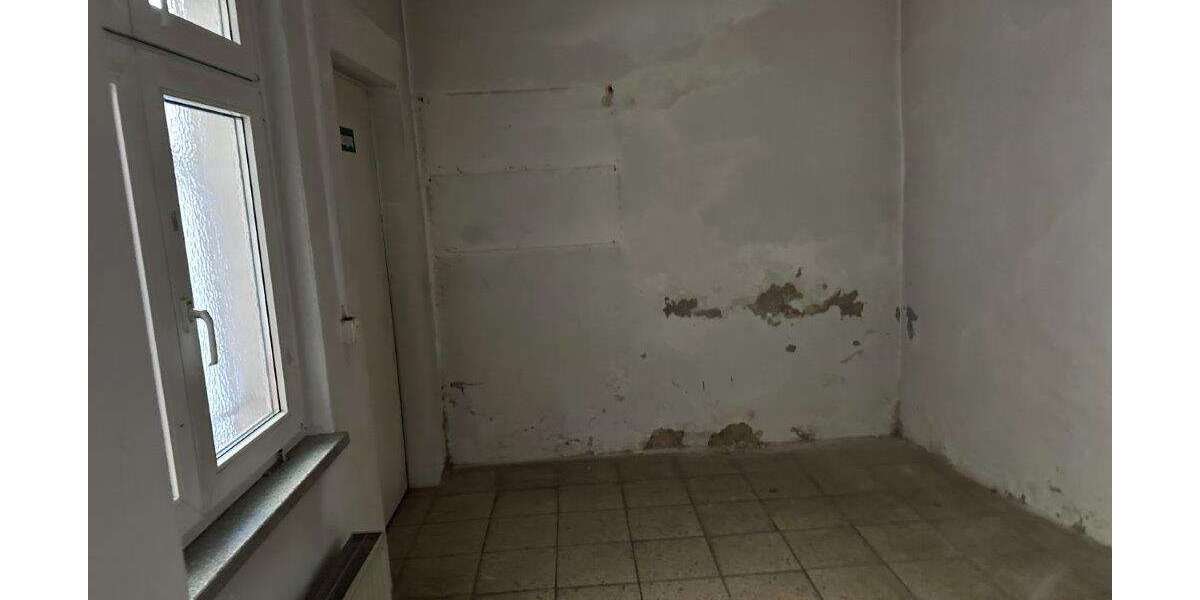 Kapitalanlage : Wohn- und Geschäftshaus mit 3 Wohneinheiten und 1 Gewerbeeinheit in 