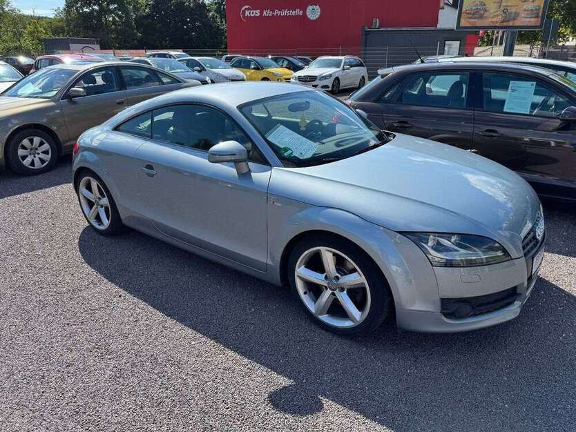 TT