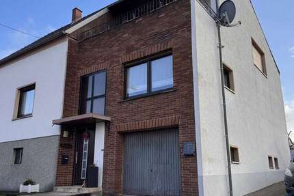 Haus zum Kaufen in Heusweiler Holz 289.000 € 208.6 m² 8 zimmer