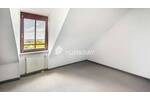 Lichtdurchflutete Dachgeschoßwohnung mit Balkon und Tiefgaragenstellplatz