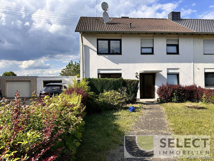 Doppelhaushälfte in ruhiger Lage mit Garage und Garten