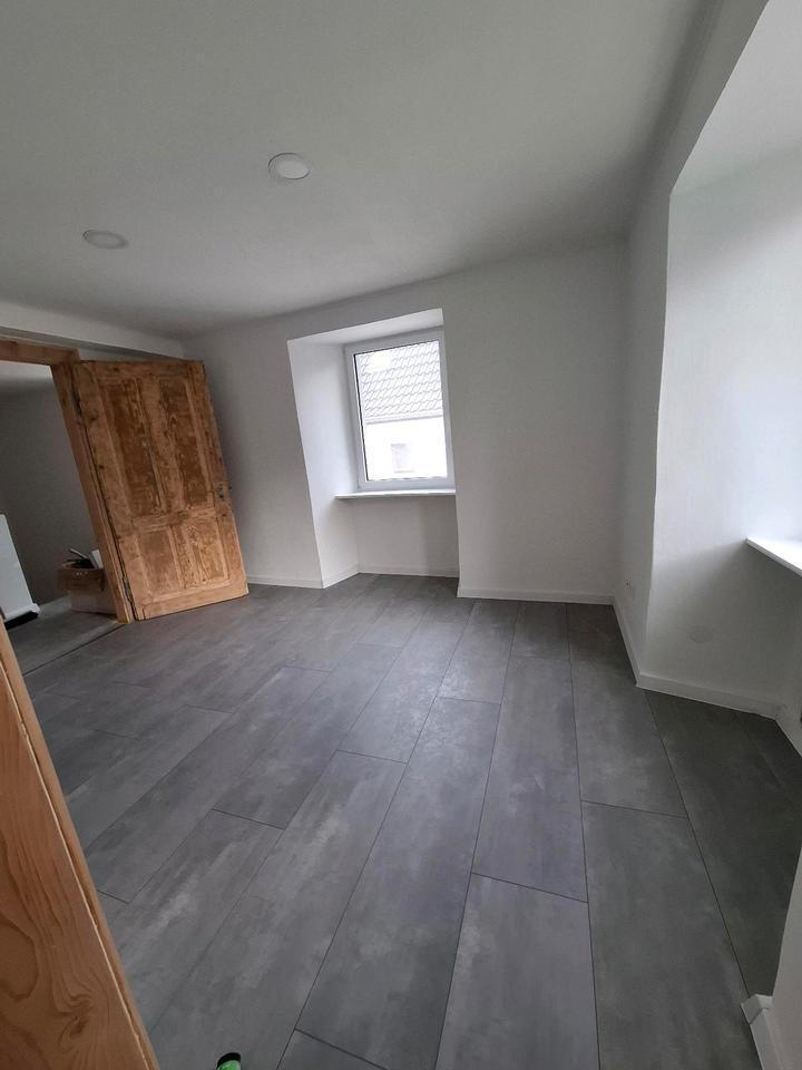 Einfamilienhaus 4,5 ZKB in Saffig - Altbaucharm trifft Moderne zimmer