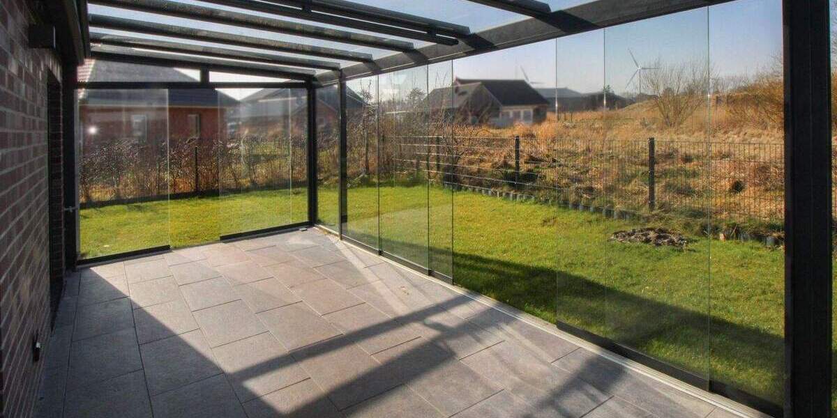 Familienoase vor Sylt: Moderne KfW-40 Doppelhaushälfte mit Wintergarten in Klanxbüll 5 zimmer